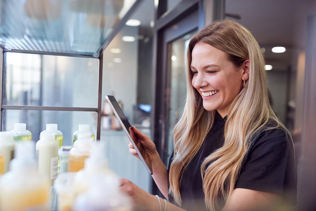 Image of a woman smiling at product